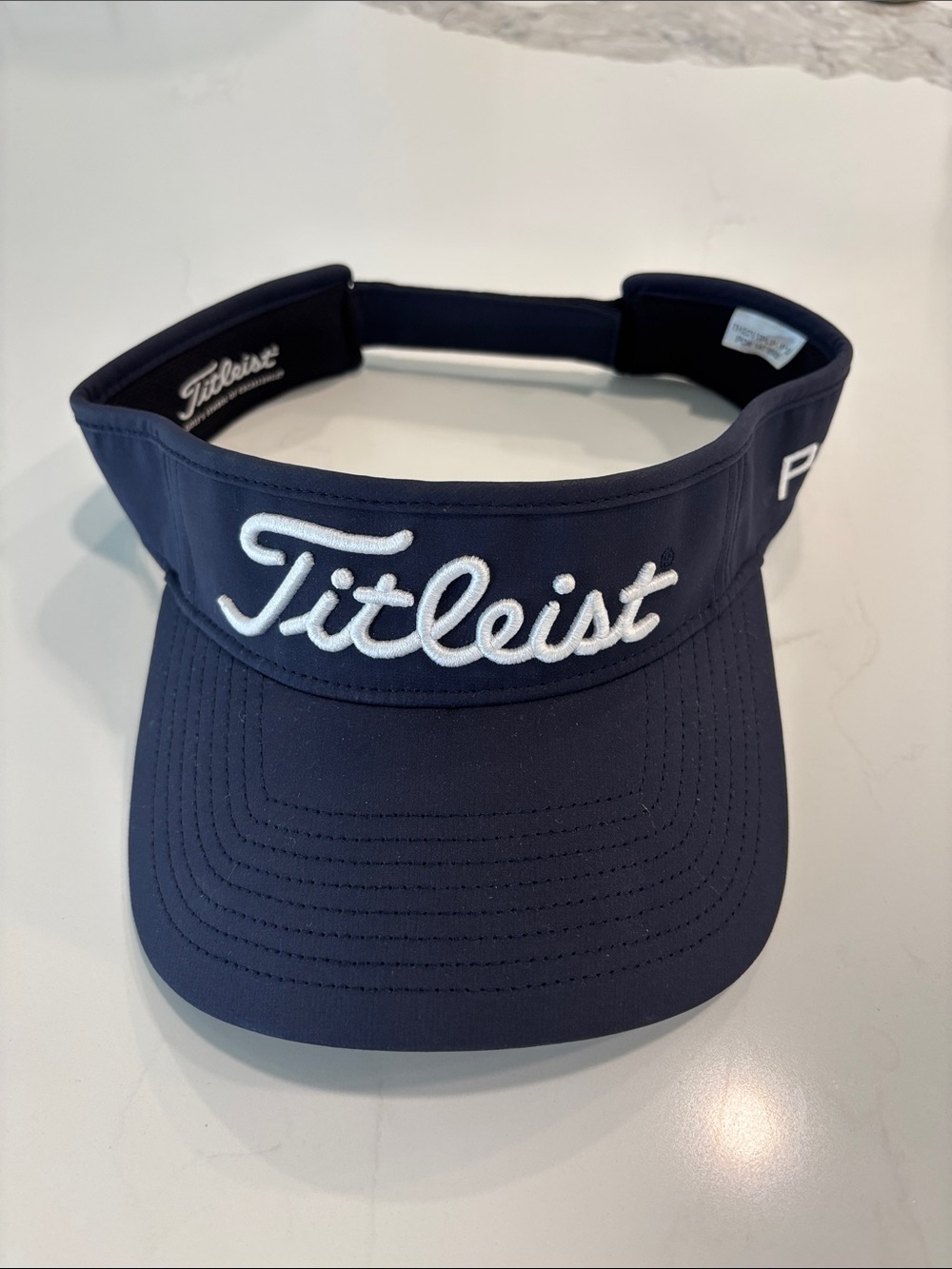 NWOT Titleist mens Navy Visor with White Script Logo